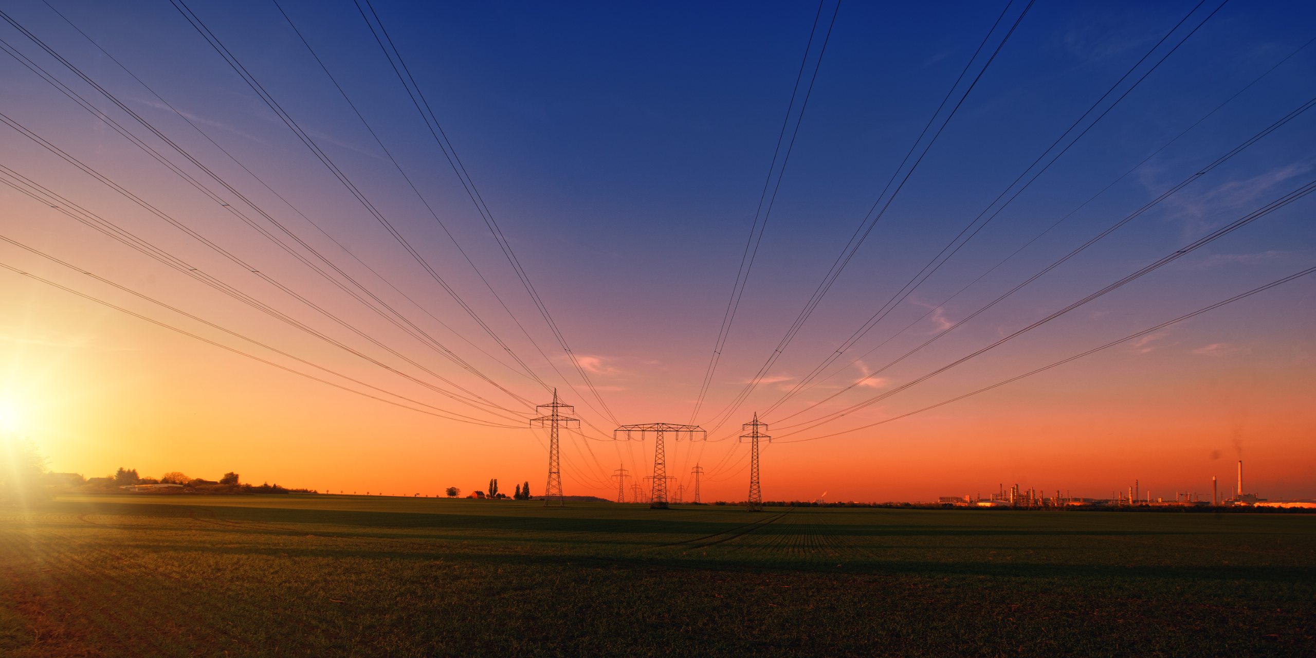 Could Renewable Energy Completely Replace Fossil Fuels? 4 Electrical towers in the field 1