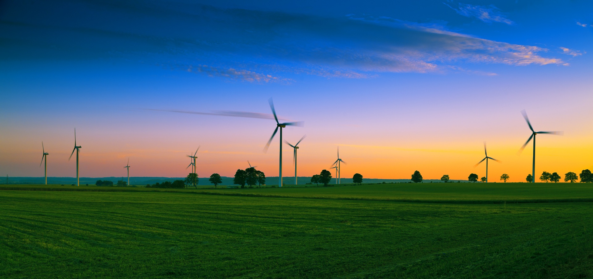 Renewable Energy Credits (Recs): The Currency Of Clean Power 1 Wind farm at sunset