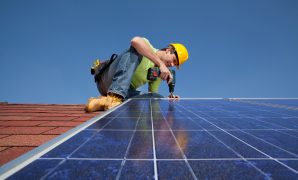Horizontal,Low,Angle,Shot,Of,A,Construction,Worker,Bending,To