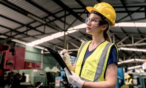 Industrial factory concept. Engineering technician or worker operating and maintenance of machinery.